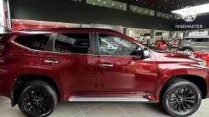 SUV hạng trung Mitsubishi Pajero Sport màu đỏ mới cập bến đại lý, thêm trang bị, giá không đổi