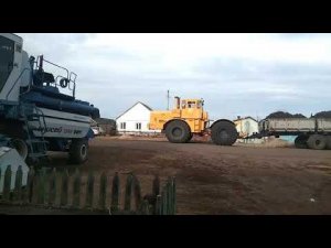 Трактор кировец К-700А с прицепом 2птс9.