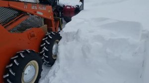 77 Gehl 2500 with heated cab & snowblower