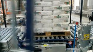 Упаковка мешков на паллете плёнкой с перфорацией | Паллетоупаковщик ROBOPAC с вращающейся рукой