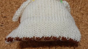 Подгиб вязаного полотна. Зубчики с отделочным цветом. Вязание на машине.