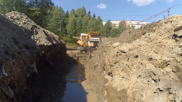 Миниэкскаватор.