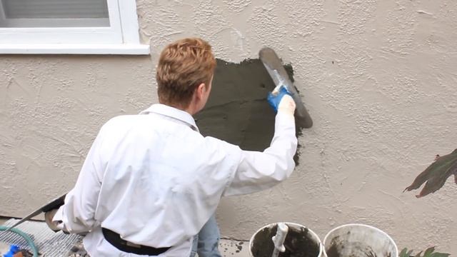 Repair a plumbing hole in a stucco wall.