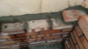 Подвал Внутреннее утепление и кладка защитных кирпичных стен