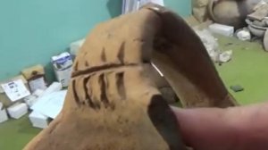 Знак на кухонном горшке с раскопа по улице Лермонтова, 40