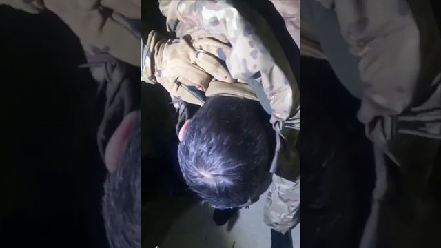 Допрос навозовца российскими военными.