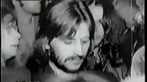 John Lennon and Ringo Starr in Crowd at a Bob Dylan Concert