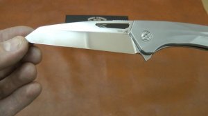 Складной нож из стали М390