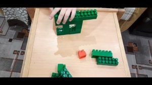 Как сделать динозавра из конструктора