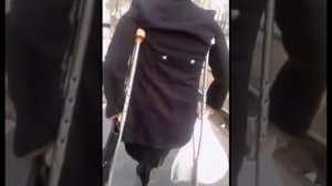 LAK amputee girl with smile of Mona Lisa crutching to the shop and come back under Ravel's Bolero