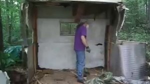 Demolishing Mobile Home with an Axe 5 of 6