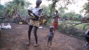 Africa: Girls are shocked by a white man. Wild Hamer tribe traditions and rituals.