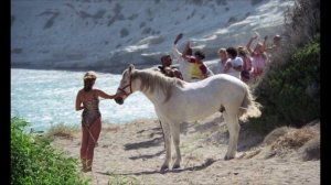 LAURA GEMSER, THE DIVINE EXOTIC GODDESS, ARRIVES ON THE BEACH IN, DIVINE EMMANUEL (1981) HD 1080p