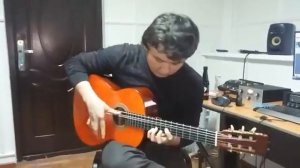 Куй Адай на гитаре