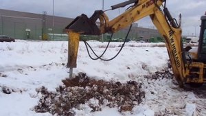 Гидромолот в Ногинском районе. Заказ трактора с отбойным молотком.