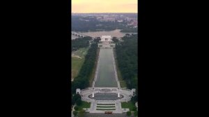 Sunset overlooking Lincoln Memorial, reflecting pool and WWII Memorial in Washington DC