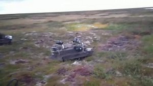 летом на снегоходе буран по болоту