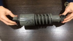 Амортизатор кабины нерегулируемый HOWO WG1642430285,1. ОРИГИНАЛ.
