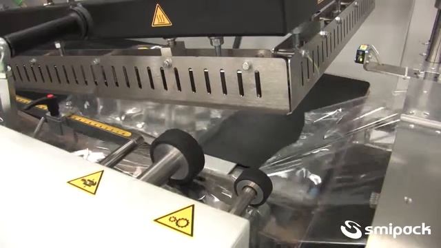 Пакверк: Smipack FP6000 автомат. Групповая упаковка флаконов в термоусадочную ПОФ пленку. смотреть онлайн