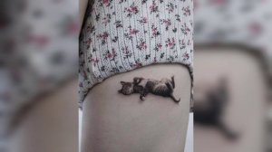 WHY DO PEOPLE GET TATTOOS OF CATS?