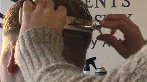 How to Do a Man's Clipper Haircut : Blending Hair with Scissors for a Man's Clipper Haircut