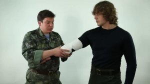 Наложение восьмиобразной повязки