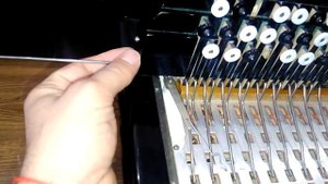 Замена кнопочных  рычагов грифа баяна 'Ансамбль 3'