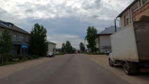 Дорога через село имени Бабушкина (Вологодская область)