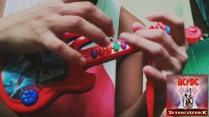 I play  AC/DC Thunderstruck on toy guitar