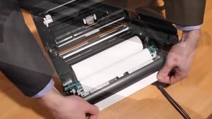 Как правильно установить бумагу для факса