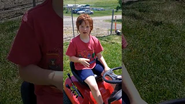 8 year old gets to ride lawnmower for the first time