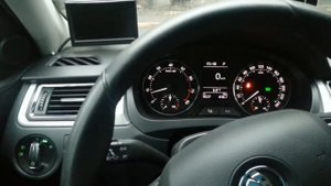Реле автоматического включения света в Skoda Rapid (день)