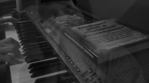 "St. Louis Blues"- piano & blues harp (W.C. Handy)