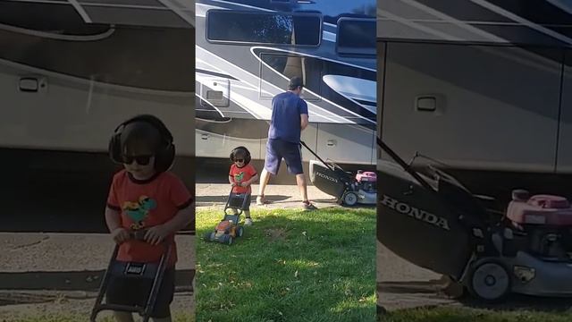 Two year old turns lawn mower on!