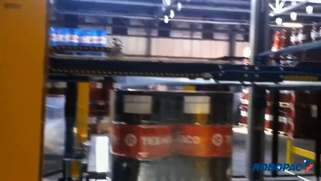 Упаковка паллет в стрейч-плёнку. Автоматический паллетообмотчик ROBOPAC с вращающимся столом.