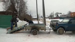 Погрузка нерабочего бурана на прицеп