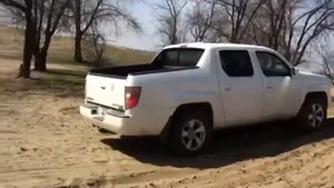 Honda ridgeline in sand