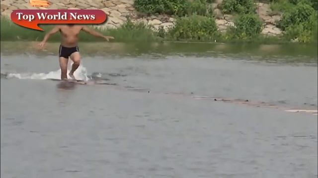 МОНАХ ПРОБЕЖАЛ 125 МЕТРОВ ПО ВОДЕ смотреть онлайн