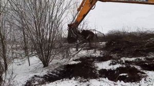расчистка  поля экскаватором