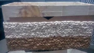 2 коробки из одной большой для хранения материалов.