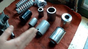 "Стаканы" задней подвески М-72