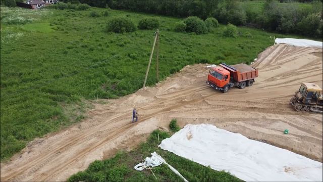 Отсыпка участка песком на берегу озера | Подготовка участка к строительству смотреть онлайн