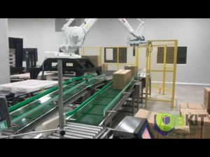 Упаковка банок в коробки