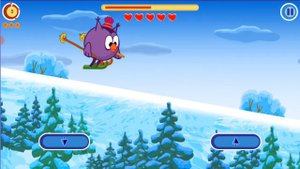 совунья спускается на лыжах с горы