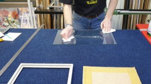 Оформление гобелена в деревянный багет под стекло