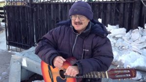 Уличный гитарист