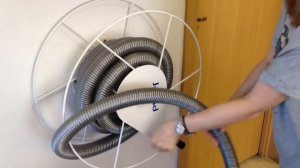 Бобина для хранения шланга встроенного пылесоса