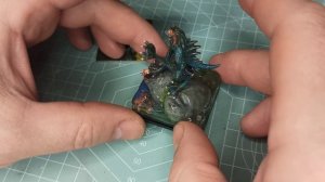 "Глубоководный". Из игры " Особняки безумия".
Монстр стоит на морском камне.