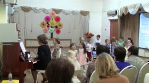 Фрагмент занятия по пению в детском саду.