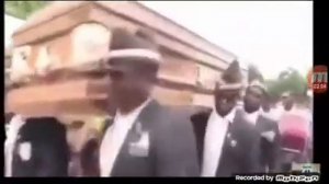 Негры танцуют с гробом